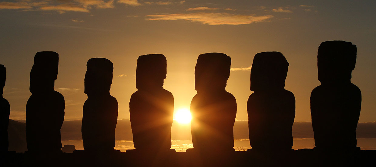 Mo'ai statues carved by the Rapa Nui people on Easter Island in Chile. Stock image from Unsplash.